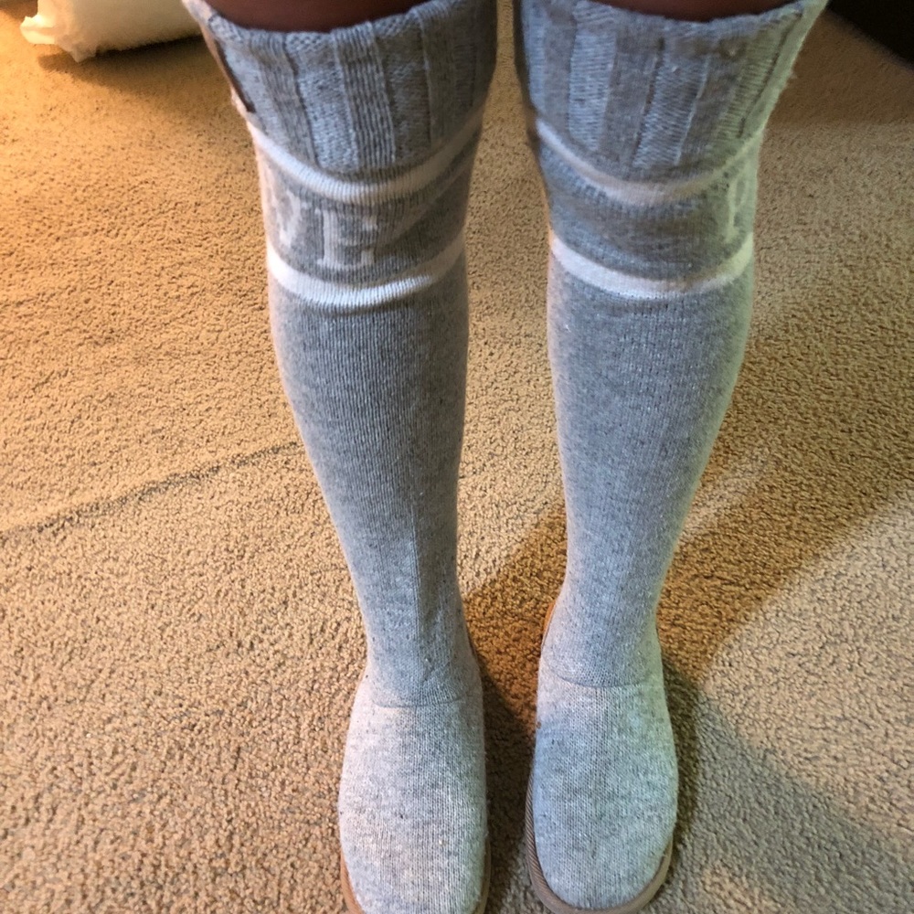 Thigh high pink boots